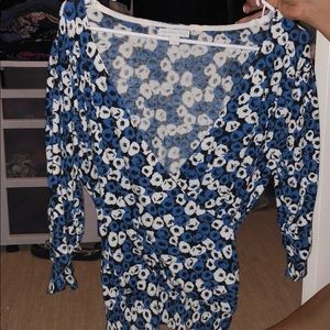 Patterned royal blue and white top.